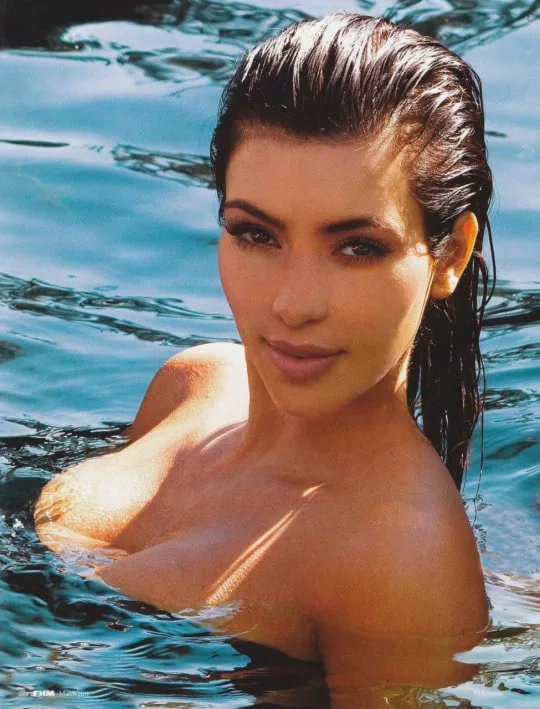 Kim Kardashian topless in pool