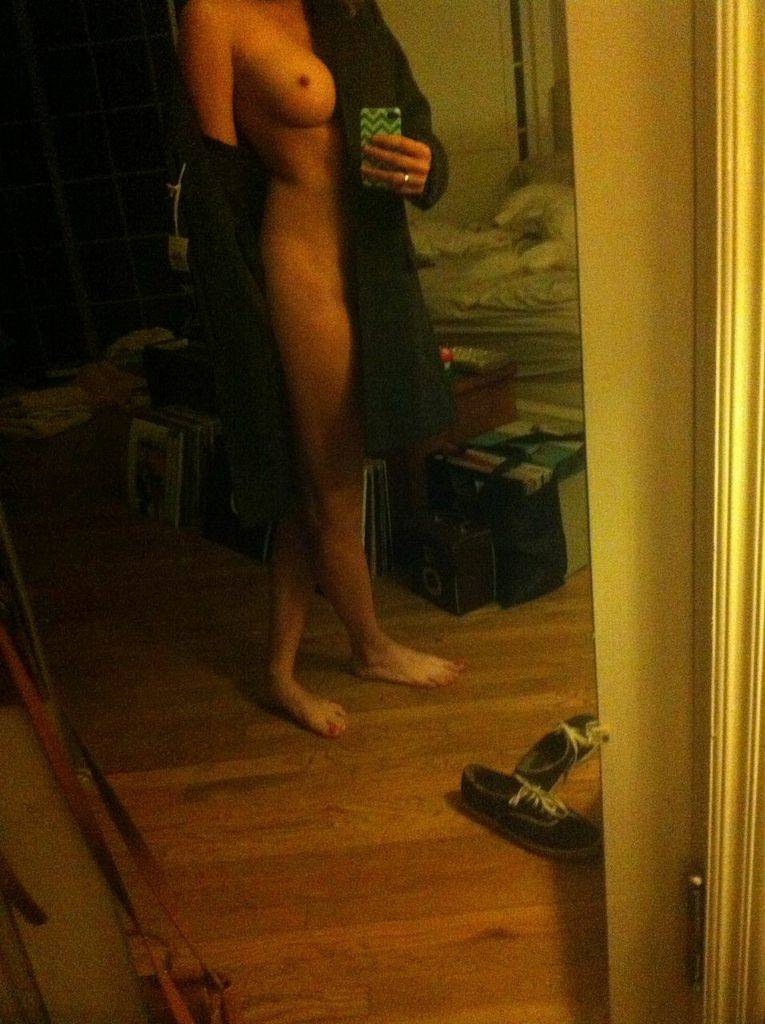 Brie Larson exposing one tit out and taking a mirror selfie