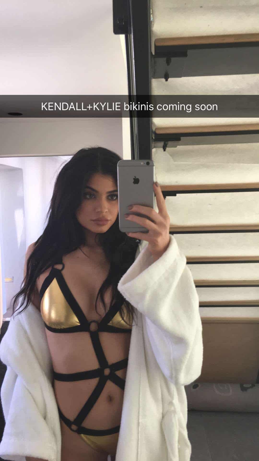 kylie jenner snap chat with gold and black bikini
