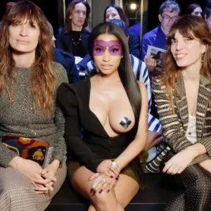 Nicki Minaj sitting breast showing