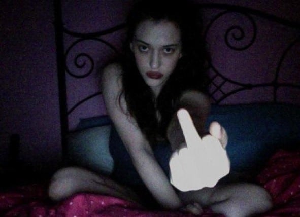 Kat Dennings hacked pic flipping off the camera