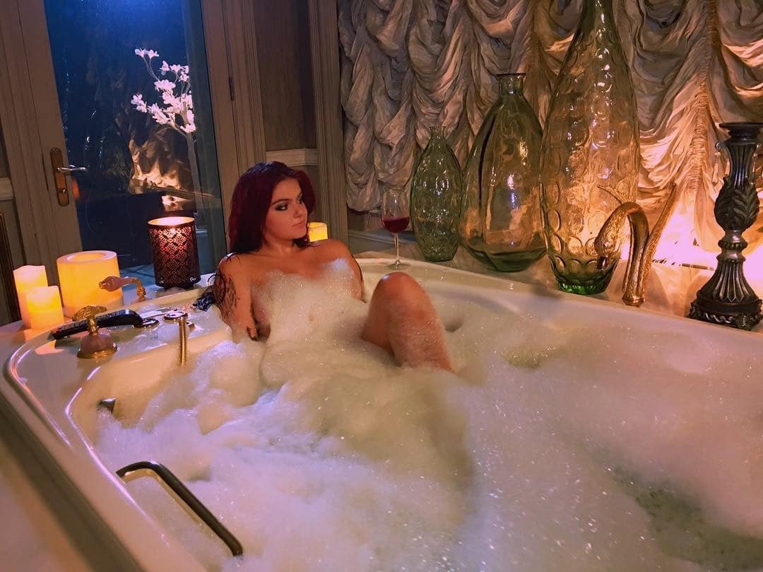 Naked Ariel Winter covered in suds