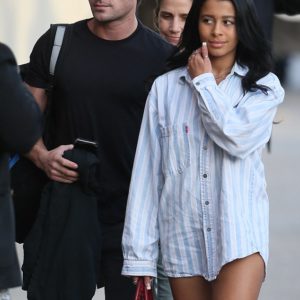 celebrity goddess sami miro in long shirt showing off her toned legs with zac efron