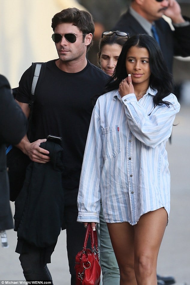 celebrity goddess sami miro in long shirt showing off her toned legs with zac efron