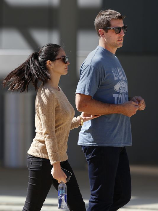 gorgeous olivia munn and her nfl football player aaron rodgers walking together