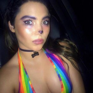 McKayla Maroney dressed as a rainbow cat showing her cleavage