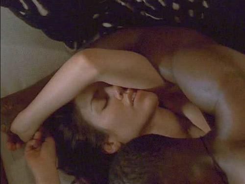 Jennifer having sex in movie scene with arm over her face