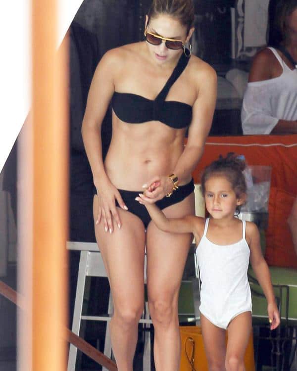 Lopez with her kid in a bikini