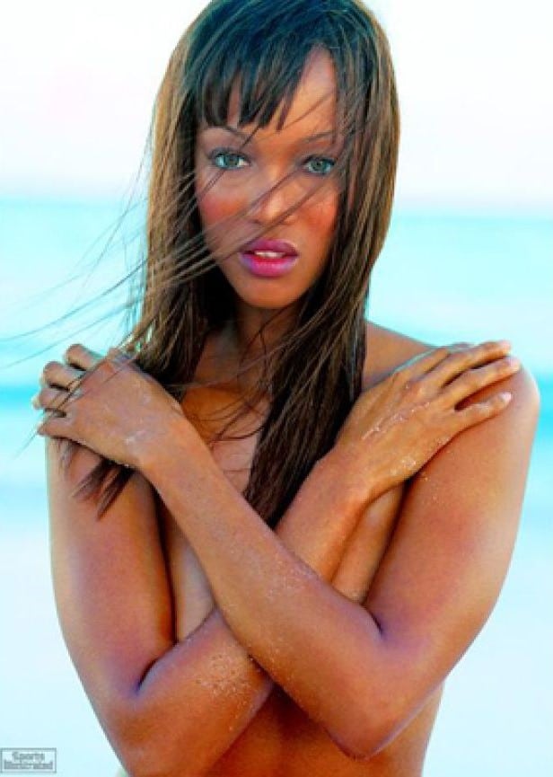 Tyra Banks posing